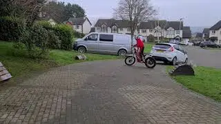 Liam on his oset 24 electric trials bike