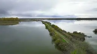 Walking on a path beside a scenic water body