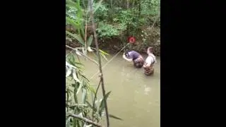 Chris and Caleb using Top-setting Wading Rod for steamflow measurement