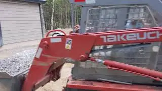 Spreading gravel with the skid steer!
