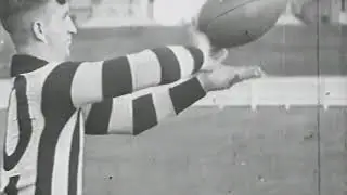 Flick Pass. Aussie Rules Football. Demonstrated by Billy Libbis of Collingwood
