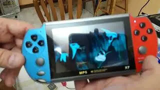 China Arcade Console MP5 X7 Switch Clone: battery Mod. and Test