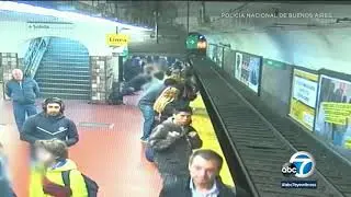 Woman falls onto tracks in Argentina, nearly hit by train | ABC7