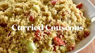 Curried Couscous | Curry Couscous with tomatoes, cucumbers, and red onions with a curry dressing