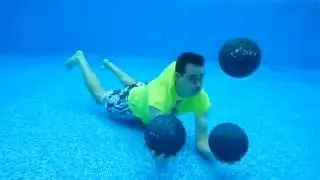 Underwater Bowling Ball Juggling