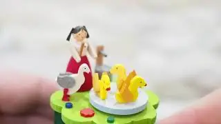 TheGermanChristmasShop   Music box   Girl feeding geese
