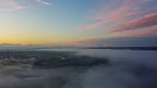 Dawning: High above the clouds