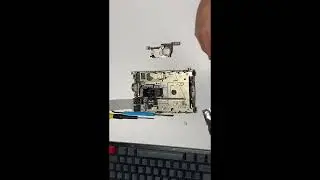 Macintosh 128K. Disk drive eject mechanism repair