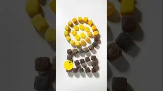 #Greedy #Pacman candy tower   Pacman chomps yellow cubes, star gummies & brown blocks in maze fun