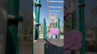 Mama swinging on the Monkey Bars