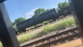 Northbound BNSF mix freight train passing temple Texas station