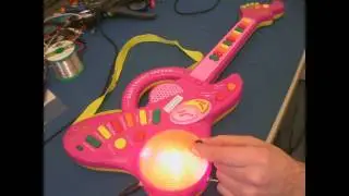 Circuit Bent Toy Guitar by freeform delusion