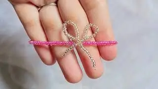 How to tie an elastic bracelet with a loop DIY at home friendship beaded jewelry knots making a knot