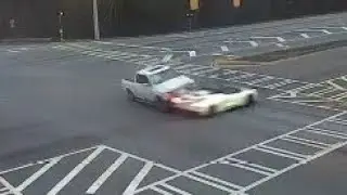 Georgia: Bad Driver Fails To Yield & T-Bones Sports Car Driver Racing Yellow Light