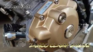 HANDMADE BOLTS AND SAMCO RADIATOR HOSE.