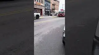 Quick catch of Ladder 149 stopping by Engine 242 quarters