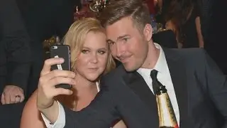 Amy Schumer Gushes Over Boyfriend Ben Hanisch: 'We Met and Totally Fell in Love'