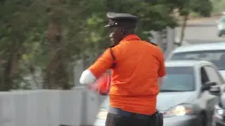Watch the traffic police in Abuja dance to enliven the city's streets