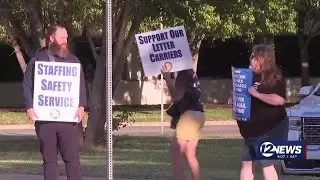 Postal workers rally, request better staffing and mail service