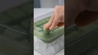 Press Button that pushes ice cubes out. Easily remove cubes with this tray