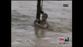 Heavy rain in southern China causes flooding and mudslides