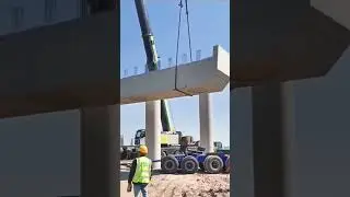 The crane lifted the heavy beam into place.