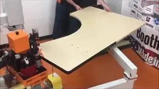 SNX nVision contour (curved) edgebander, egdebanding a large work surface.