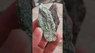 This is a symbiotic mine of green mica and ruby