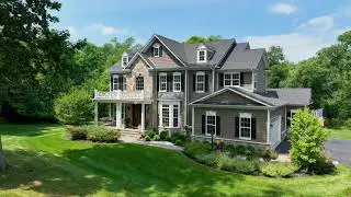 Meticulously maintained Carrington Homes built home on private & serene 4 acre lot in Round Hill
