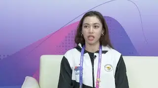GLOBALink | Chinese coach leads Brunei wushu team to win historic silver at Asian Games