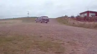 FORD COURIER SIDEWAYS IN THE GRAVEL