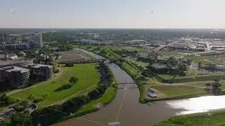Trinity River in Fort Worth, Texas, from an aerial point of view. Urban landscape, green spaces, and