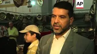 Iraqi delegates at international show in Tehran react to events at home