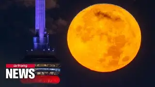 Rare super blue moon lights up skies around the world