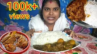 Eating spicy mutton curry and rice,,