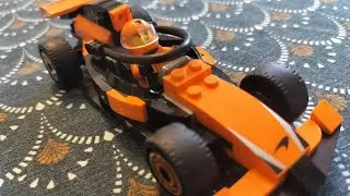 Sav builds the Lego McLaren F1 car. 