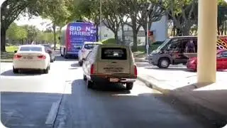BIDEN'S BUS RUNS RED LIGHT TO ESCAPE TRUMP HEARSE