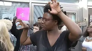 Prince fans dance in his memory outside Harlem Apollo Theatre