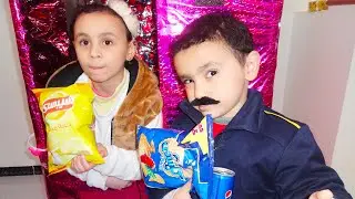الشرطي حمودي ينقذ ماكينة الحلويات من الحرامي!
