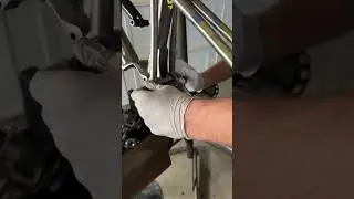 Installing the rear triangle on the FStV1.2. It&rsquo;s a tight fit with the titanium spinner.