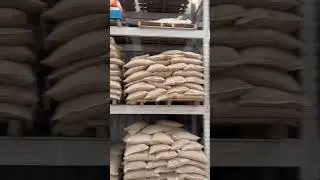 This shows our warehouse for producing water-based paint, where raw materials are neatly arranged