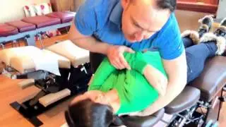 Burlington ON Chiropractor Dr. Pete Angerilli adjusts woman with plantar fasciitis