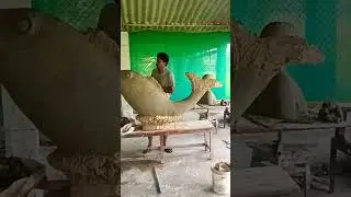 Fish making process #fish #sculpture #water #outdoors #waterfall #parks #conventions