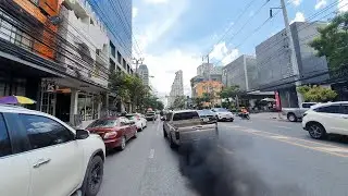Bangkok Crazy Driver speeding up in traffic jam Almost hits a motorcycle Close Call