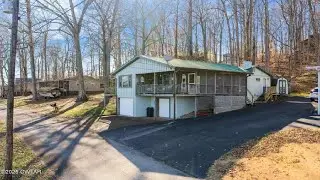 982 Lost Creek Boat Dock Road, Decaturville, TN Presented by Shelby Robertson.