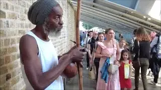 LONDON STREET PERFORMER, STREET MUSIC, UHADI, MUSICAL BOW, TRADITIONAL AFRICAN MUSIC, CALABASH BOW
