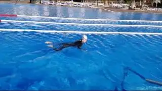 Swimming Without Stress: Breaststroke in Robotic, Mechanical versus More Flowing Style
