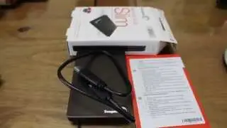 Распаковка внешнего жесткого диска Seagate Backup Plus Slim емкостью 2 ТБ