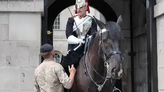 Soldier checks on the Guard before Change Over. 