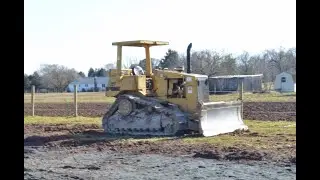 Spreading Stone Dust with Caterpillar D4H Dozer